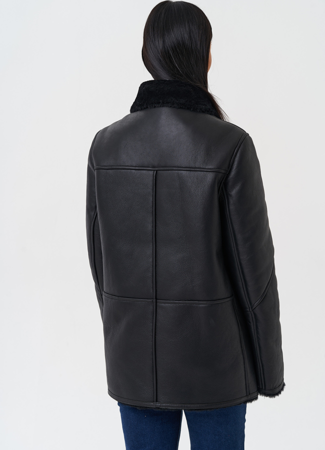 Женская дубленка черного цвета  модель № 28703 универмаг малина