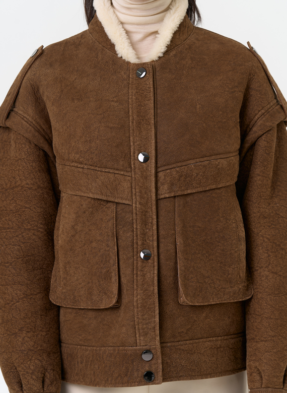 Женская натуральная дубленка в коричневом цвете